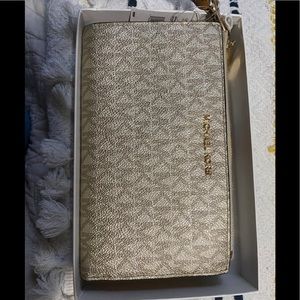 New tags Michael Kors gold wristlet wallet